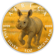 Pièce de monnaie de 1 oz en argent fin coloré « Sprint dans la savane : le petit rhinocéros joueur d’Afrique »